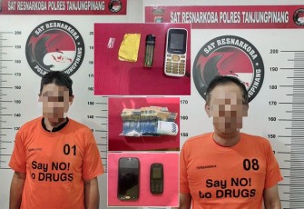 Tersangka dan barang bukti saat diamankan