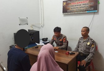 Korban saat melapor ke aparat kepolisian