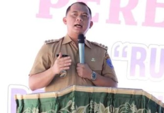 Bupati Labuhanbatu dr. Erik Adtrada Ritonga, MKM