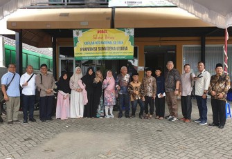 Kadis Kominfo Kabupaten Asahan Syamsuddin, SH, MM saat ikut mendampingi Bupati Asahan sebagai peninjau pada MTQ Nasional XXIX Tahun 2022 di Kalimantan Selatan, Jum'at (14/10/2022).