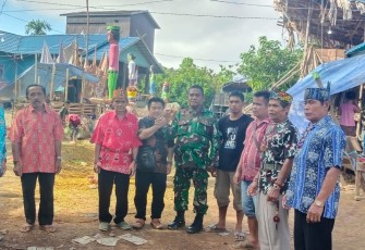 Babinsa Koramil Kahayan Hulu Utara Hadiri Ritual Tiwah Desa Tumbang Maraya
