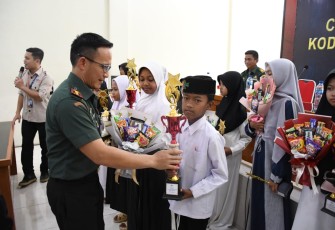 Kodim 0802/Ponorogo dan Yatim Mandiri Gelar OMATIQ