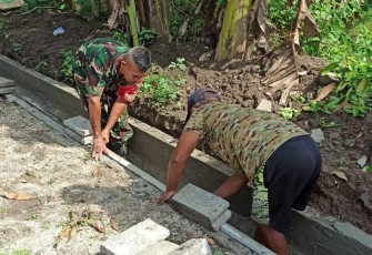 Perbaiki saluran air wilayah desa binaan 