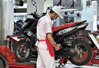 Ilustrasi sepeda motor merk Honda