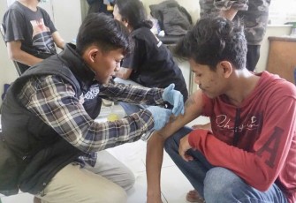 Warga binaan Lapas Cilegon saat proses hapus tato, Kamis (19/10)