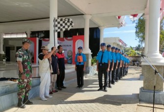 Babinsa Koramil 0801/11 Donorojo saat Hadiri Lomba Gerak Jalan dan PBB