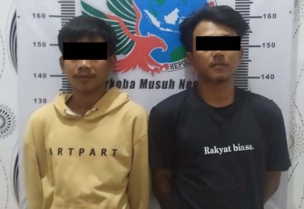 Dua tersangka saat diamankan