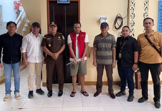 Terpidana Johansyah (diborgol) saat diamankan