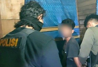 Pelaku saat diamankan Tim Tarsius Polres Bitung