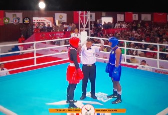 Petinju Elite Women Papua Barat Tundukkan Lawan Asal Kalsel di PON XXI dengan Kemenangan Telak