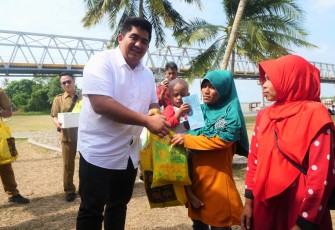 Roby dan Hafizha Sosialisasikan Gemar Makan Ikan ke Masyarakat
