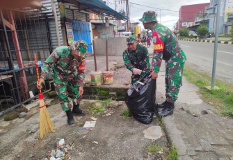 Kodim 1710/Mimika Ikuti Kegiatan Karya Bakti Pembersihan Lingkungan Dalam Rangka Menyambut MTQ Ke-XXX Papua di Kota Timika