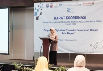 Pj Sekda Kota Depok, Nina Suzana membuka Rakor Tim Percepatan dan Perluasan Digitalisasi Daerah (TP2DD) tahun 2024 di Hotel Santika hari ini Selasa (19/11/24)