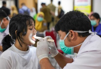 Pengecekan kesehatan gratis anak sekolah