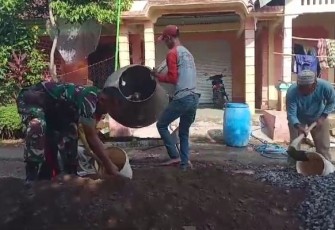Bantu rabat jalan desa binaan 