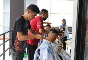 Rudenim Medan Gelar Pangkas Rambut dan Makan Bergizi Gratis dalam Rangka Semarak HUT RI ke-80
