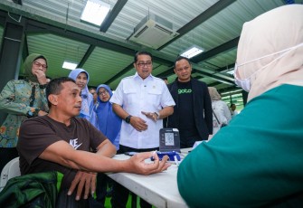 Menteri Ekonomi Kreatif, Teuku Riefky Harsya, menghadiri kegiatan satu tahun pelaksanaan program Cek Kesehatan Gratis (CKG) di Gojek Ops Office, Kemang, Jakarta, Rabu (11/2/2026).