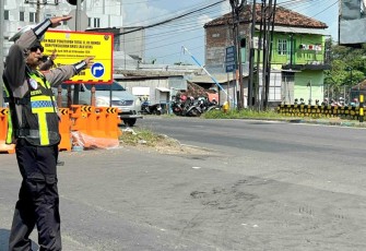 Pengamanan arus lalu lintas 