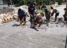 Pengecoran jalan di kampung Sesor