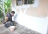 Perapihan acian dinding RTLH