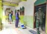 Bsrsihkan mushola di lokasi TMMD