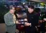 Menteri Ekonomi Kreatif/Kepala Badan Ekonomi Kreatif (Ekraf), Teuku Riefky Harsya (kiri), berbincang dengan Director sekaligus Founder SKAK Studio, Bayu Skak (kanan), saat menghadiri gala premiere film Foufo di Epicentrum XXI, Jakarta, Jumat (3/7/2026).