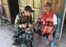 Yonarmed 12 Kostrad Peduli Kesehatan Masyarakat Perbatasan di Desa Alas Utara