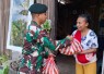 Yonarmed 12 Kostrad Tebar Kepedulian Lewat Jumat Berkah, Rutin Salurkan Sembako untuk Warga Umanen